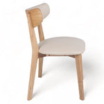 Modern wooden chair with beige upholstered seat and backrest, minimalist design for dining or office use