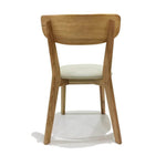 Modern wooden dining chair with light cushion, minimalist design for home or office use