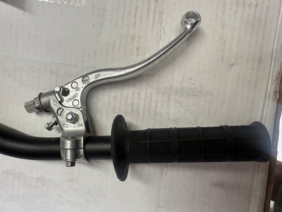 Motorcycle brake lever with black grip handle, metallic finish, and adjustment screws