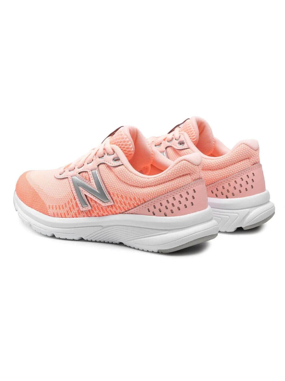 Pink New Balance running shoes with white soles and silver N logo, breathable mesh design