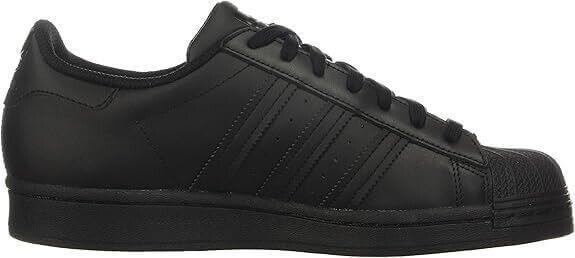 Black Adidas Superstar sneaker with classic stripes and rubber toe cap