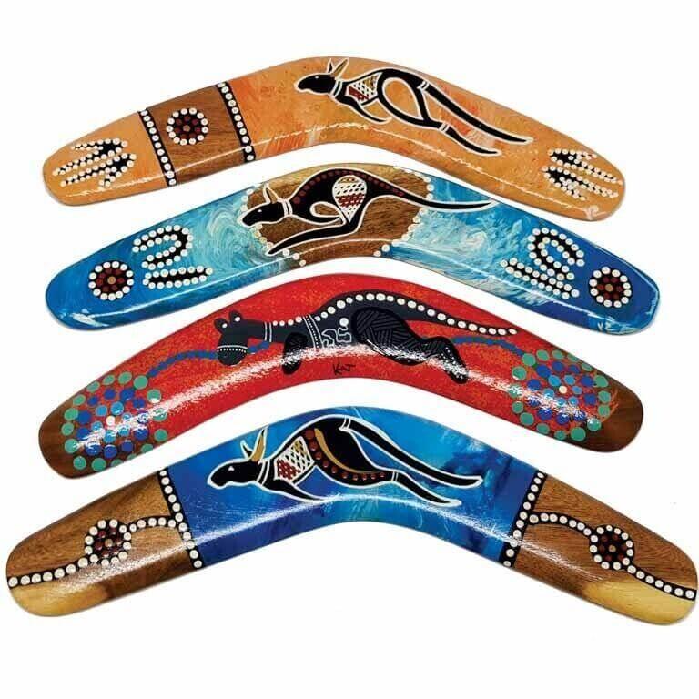 Colorful Australian boomerangs with Aboriginal art designs featuring kangaroos and dot patterns
