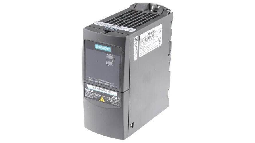 Siemens Micromaster 440 industrial inverter for motor control, compact grey unit with display and warning labels