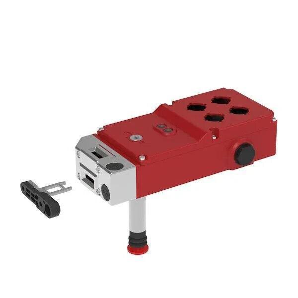 Red industrial control unit with black knobs and metal connector for tractor or truck parts