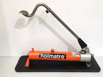 Holmatro hydraulic foot pump with orange cylinder and metal pedal for industrial use