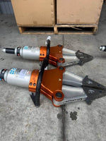 Holmatro hydraulic rescue tools with orange and silver design, ideal for emergency vehicle extrication.
