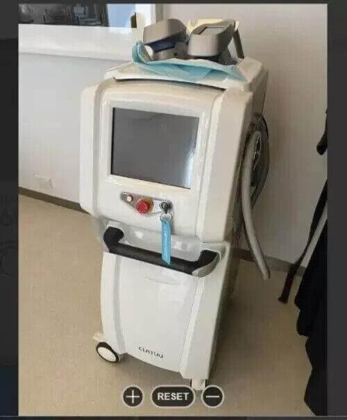 White medical laser machine with screen and controls, labeled Clatuu, in clinical setting