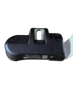 Black plastic device with QR code, labeled 'Made in UK' and model details, for industrial or office use.