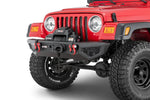 Red Jeep with off-road bumper, winch, and rugged tires for tough terrain adventures.