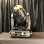 Professional stage moving head light with control panel, ideal for event lighting setups