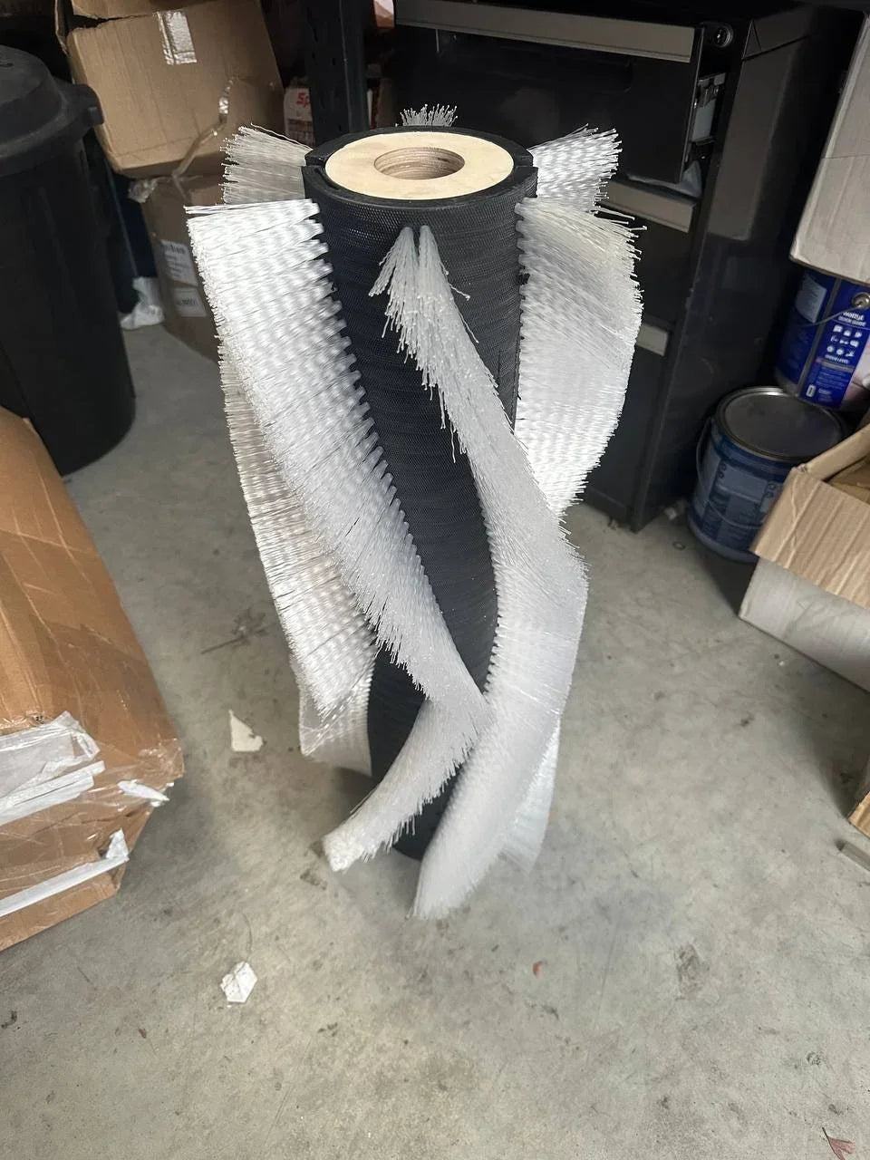 Industrial brush roller with white bristles for machinery maintenance