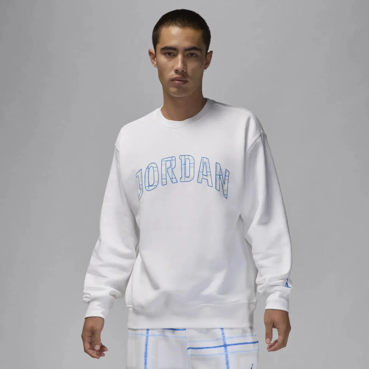 White Jordan sweatshirt with blue outlined logo, casual men's apparel
