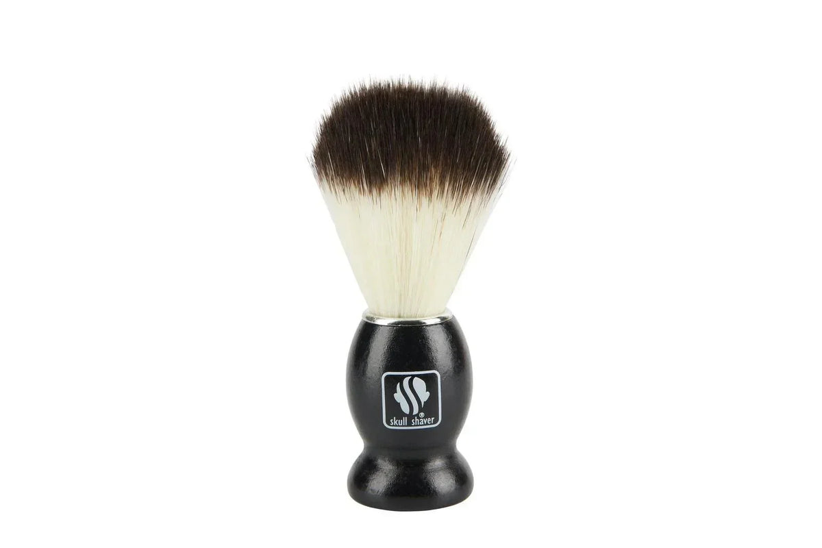 Skull Shaver black-handled shaving brush with two-tone bristles for wet shave grooming
