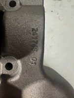 Metal tractor part with engraved numbers, durable industrial component for heavy machinery