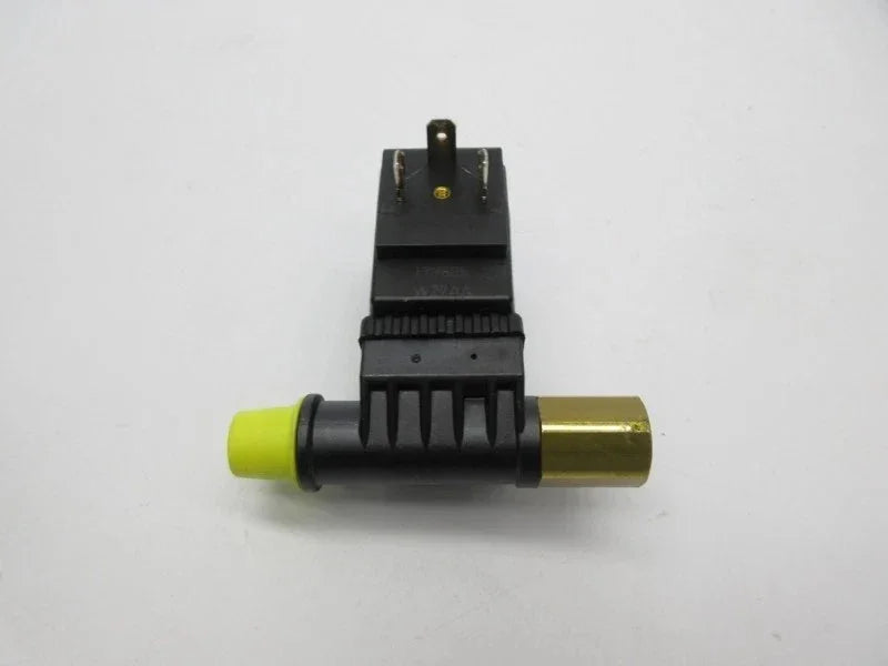 Black electrical connector with yellow and brass ends for tractor or industrial equipment parts