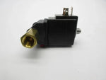 Black solenoid valve with brass fitting for industrial or tractor parts applications