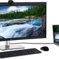 Dell monitor and laptop setup with keyboard, mouse, and scenic waterfall display