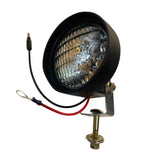 Round tractor headlamp with mounting bracket and attached wiring, suitable for combine or agricultural vehicles