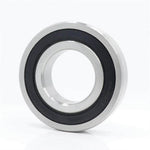 Deep groove radial ball bearing with metal and black seal, isolated on white background