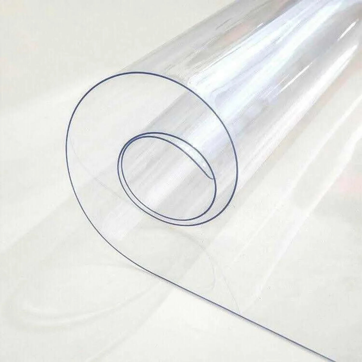 Transparent clear PVC table cover roll showing its flexible waterproof material