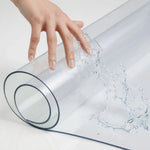 Clear PVC roll table cover with waterproof protection, ideal for tablecloth use