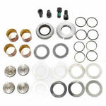 King pin bearing kit for trucks with bushings, seals, washers, bolts, and O-rings laid out on white background