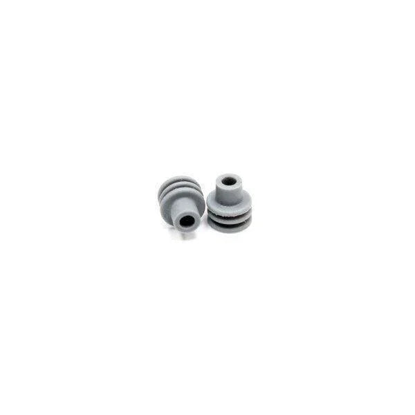 Gray plug sealers for International Navistar trucks, close-up on white background