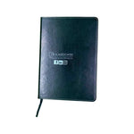 Black A5 leather notebook with white stitching, embossed business logo and social media icons on cover
