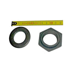 Pinion nut and round washer hardware kit for tractor, pictured with measuring tape