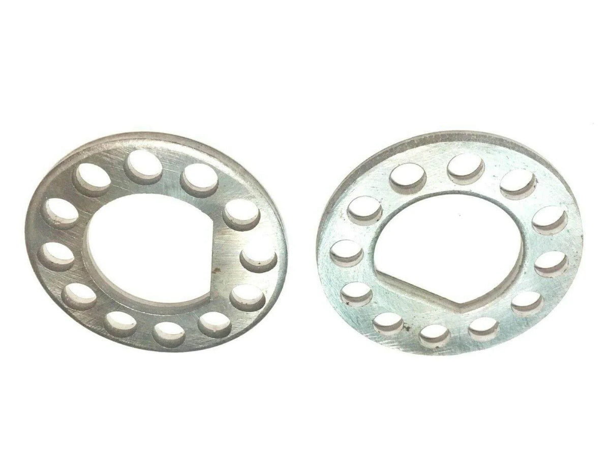 Pair of metal steer axle spindle lock washers with multiple holes, suitable for truck parts