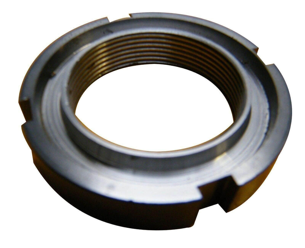 Threaded metal commutator nut for tractor parts on white background