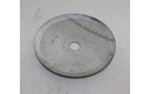 Round metal tractor plate with central hole, replacement part on white background