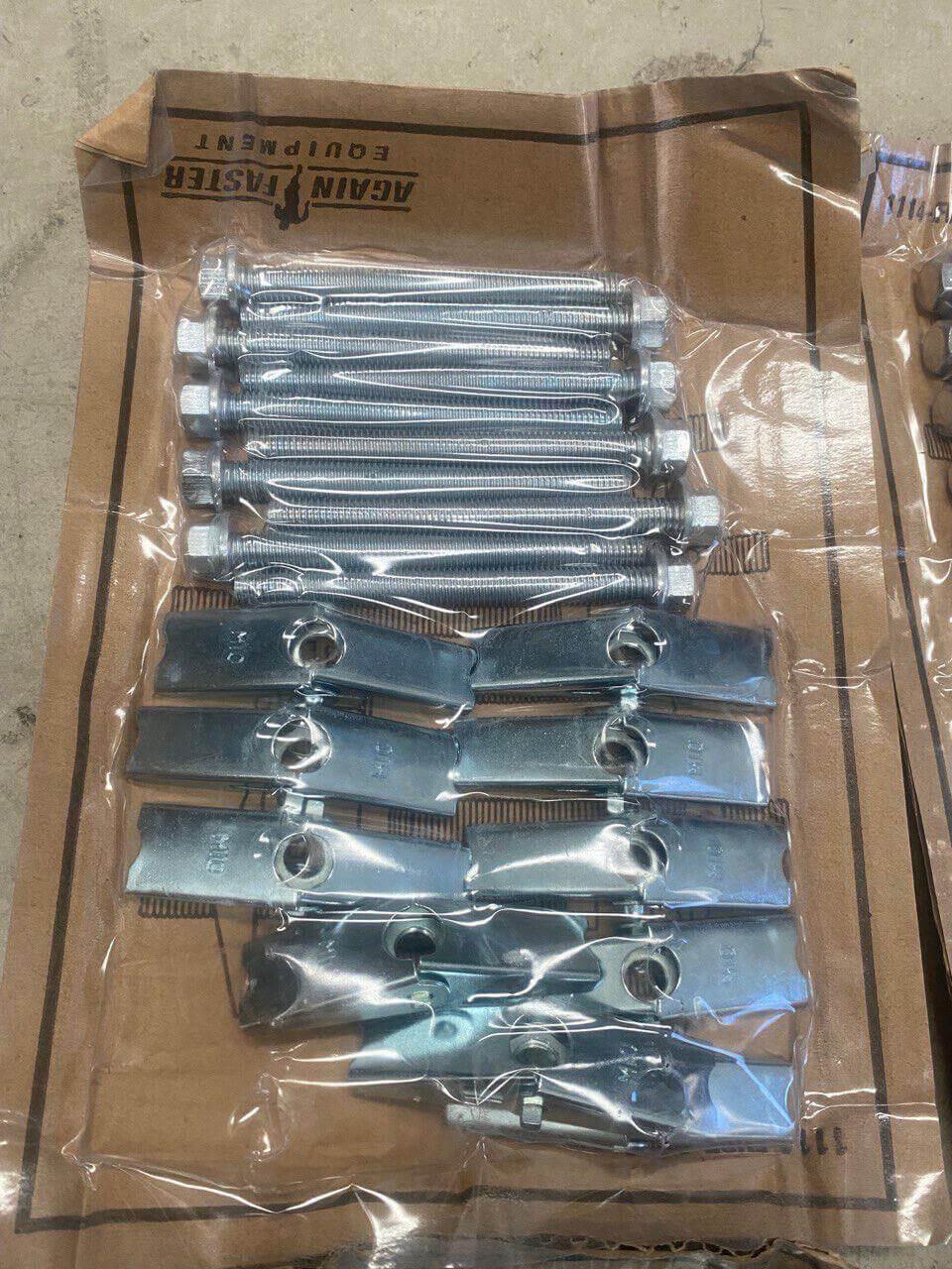 Bulk lot of metal bolts, nuts, and brackets for heavy-duty machinery or gym equipment