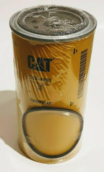 Yellow CAT 513-4490 fuel water separator filter sealed in plastic, product labeling visible