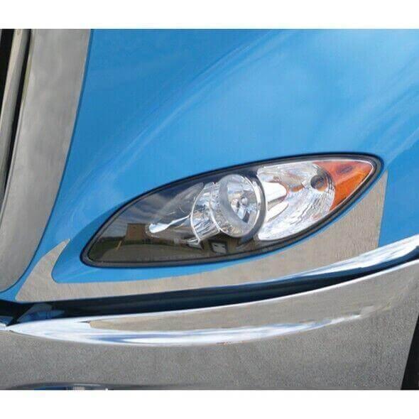 Chrome headlight trim accent on blue International Prostar truck headlight