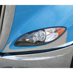 Chrome headlight trim accent on blue International Prostar truck headlight