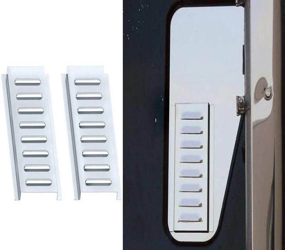 Pair of stainless steel louvered vent covers for ProStar sleeper truck, installed on door.