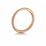 Rose gold surgical steel hoop ring for nose, lip, or ear piercing on white background