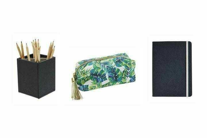 Tropical leaf print pencil case with zipper, black notebook, and pencil holder with pencils