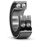 Double row ball bearing with inner and outer metal rings, cross-sectional view, industrial part