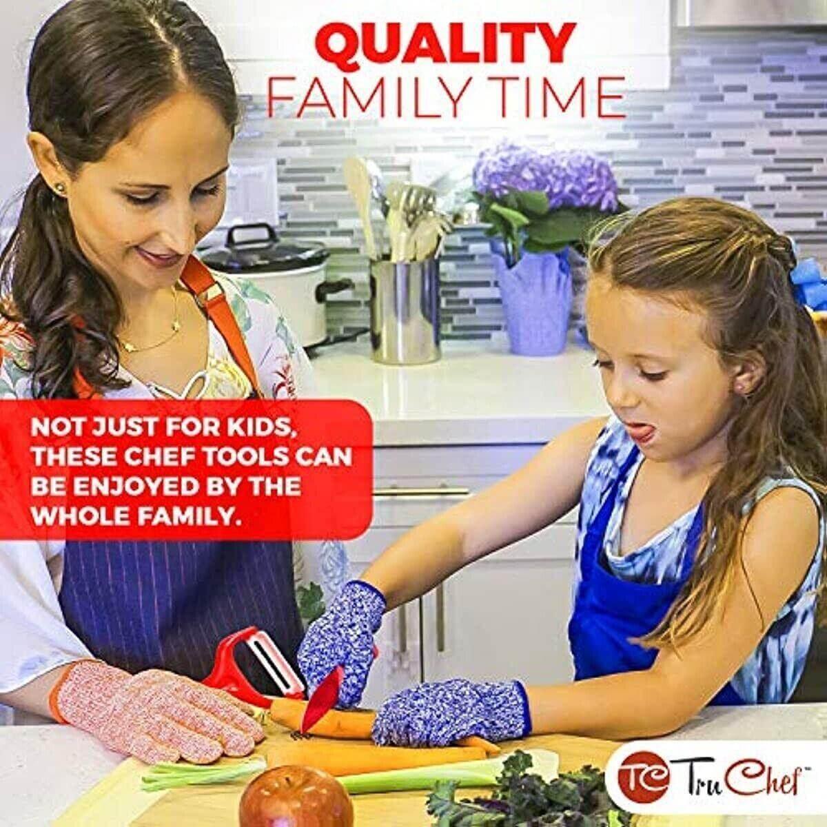 Child using kid-safe knife set with adult in kitchen, preparing vegetables together.