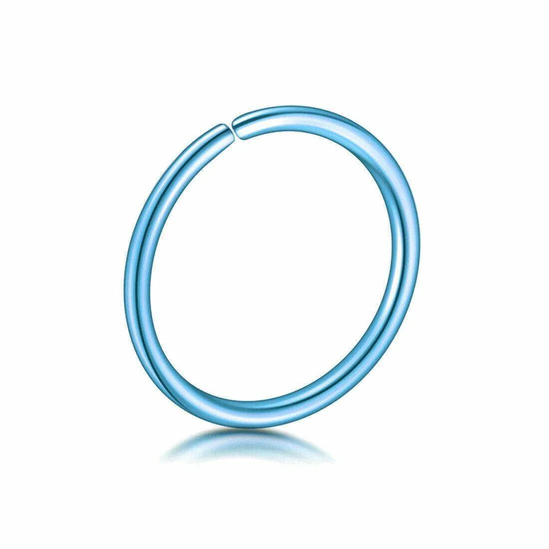 Small blue fake nose ring hoop body piercing jewelry on white background