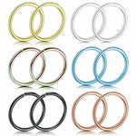 Assorted fake nose rings in gold, silver, rainbow, blue, black, and rose gold colors.