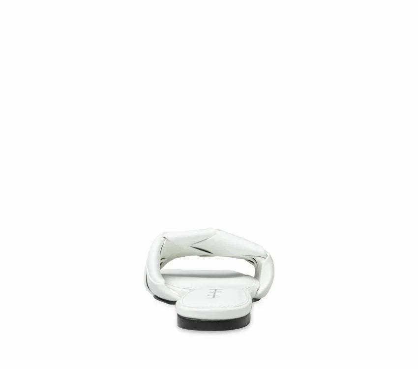 White quilted leather women's sandal wedge slide, slip-on, rear view on white background